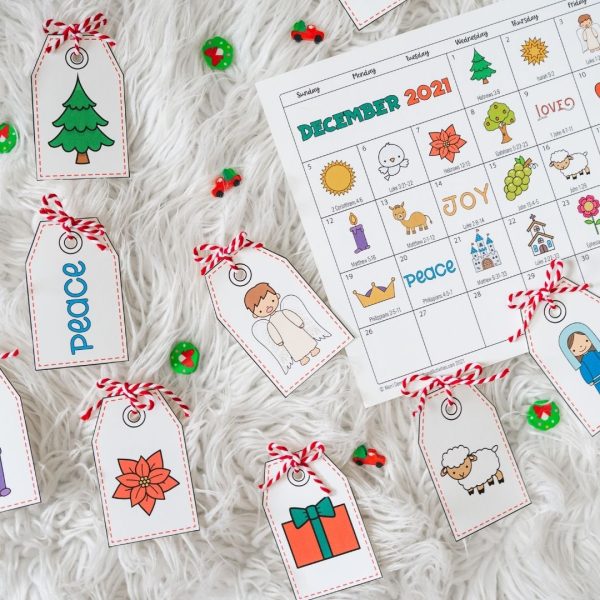 christmas calendar and tags on white shag rug